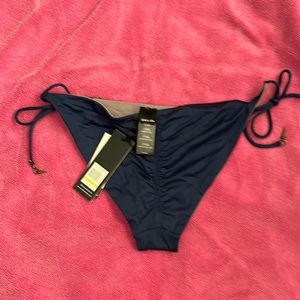 Reversible navy/grey bikini bottom.
